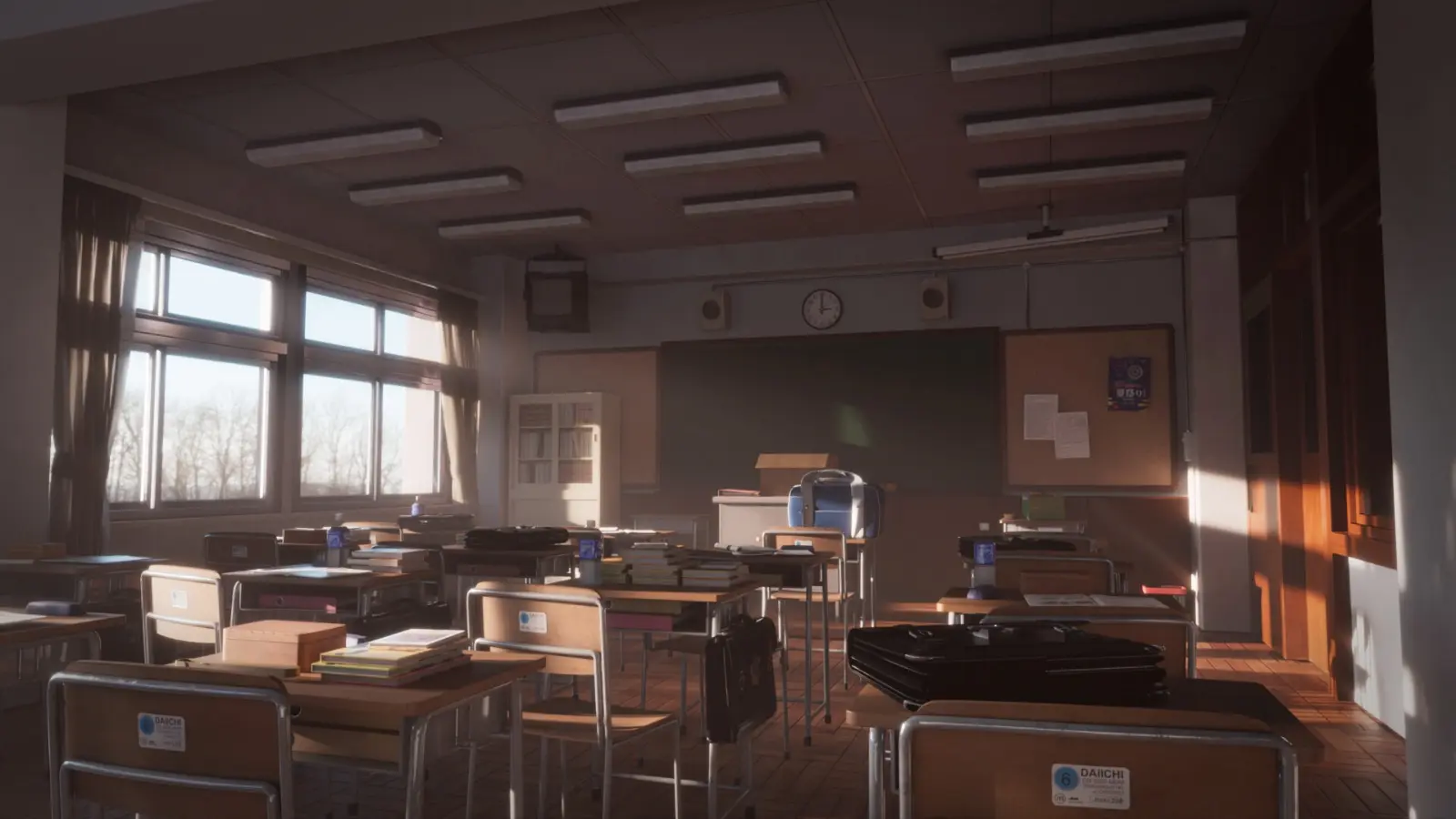 Several white blocks sit on a stool in an empty classroom.