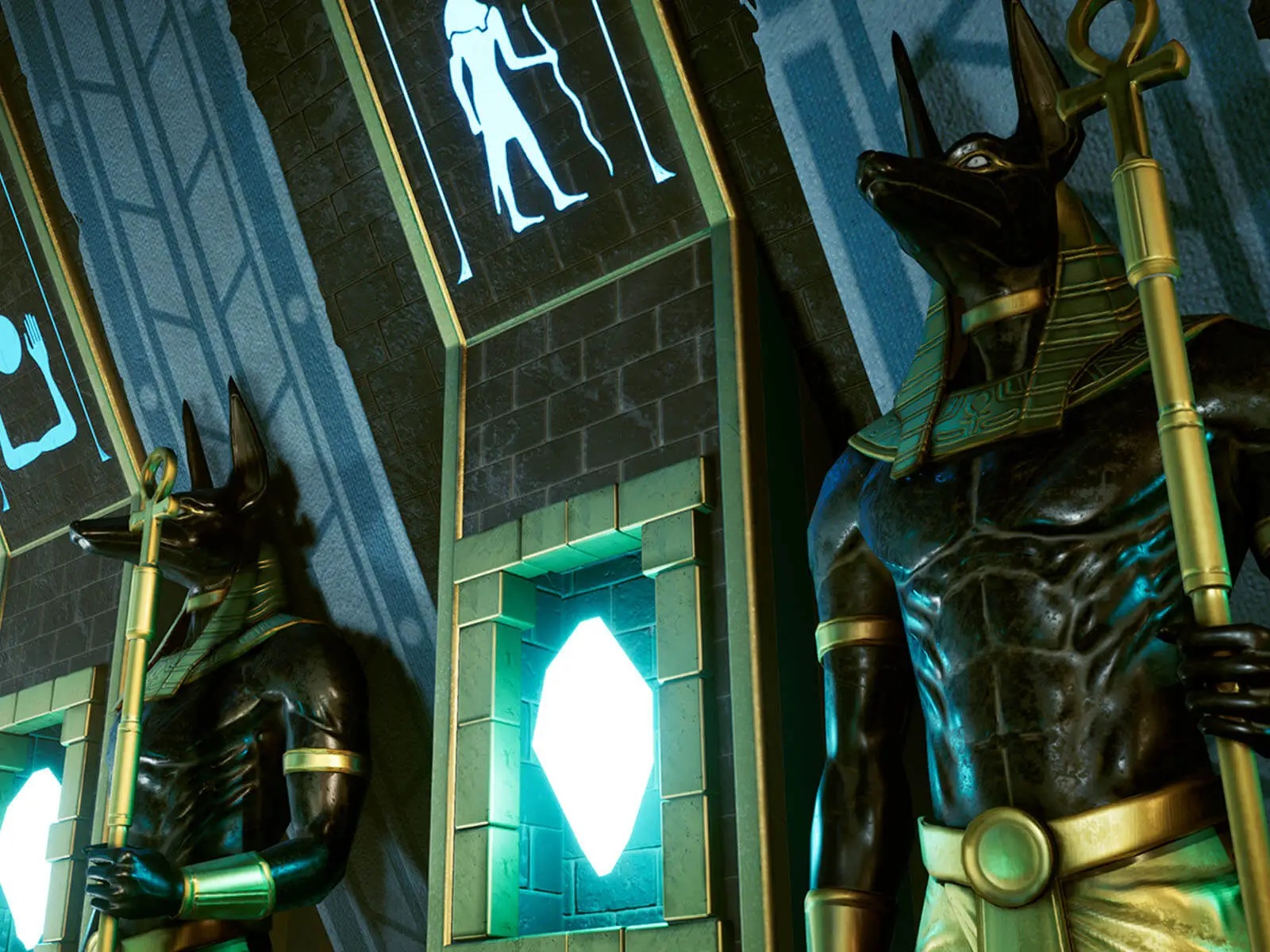 Statues of Anubis holding ankh staffs.