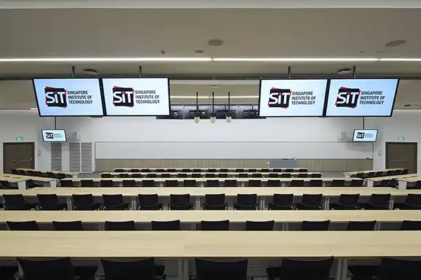 Rear view from a large empty SIT lecture hall.