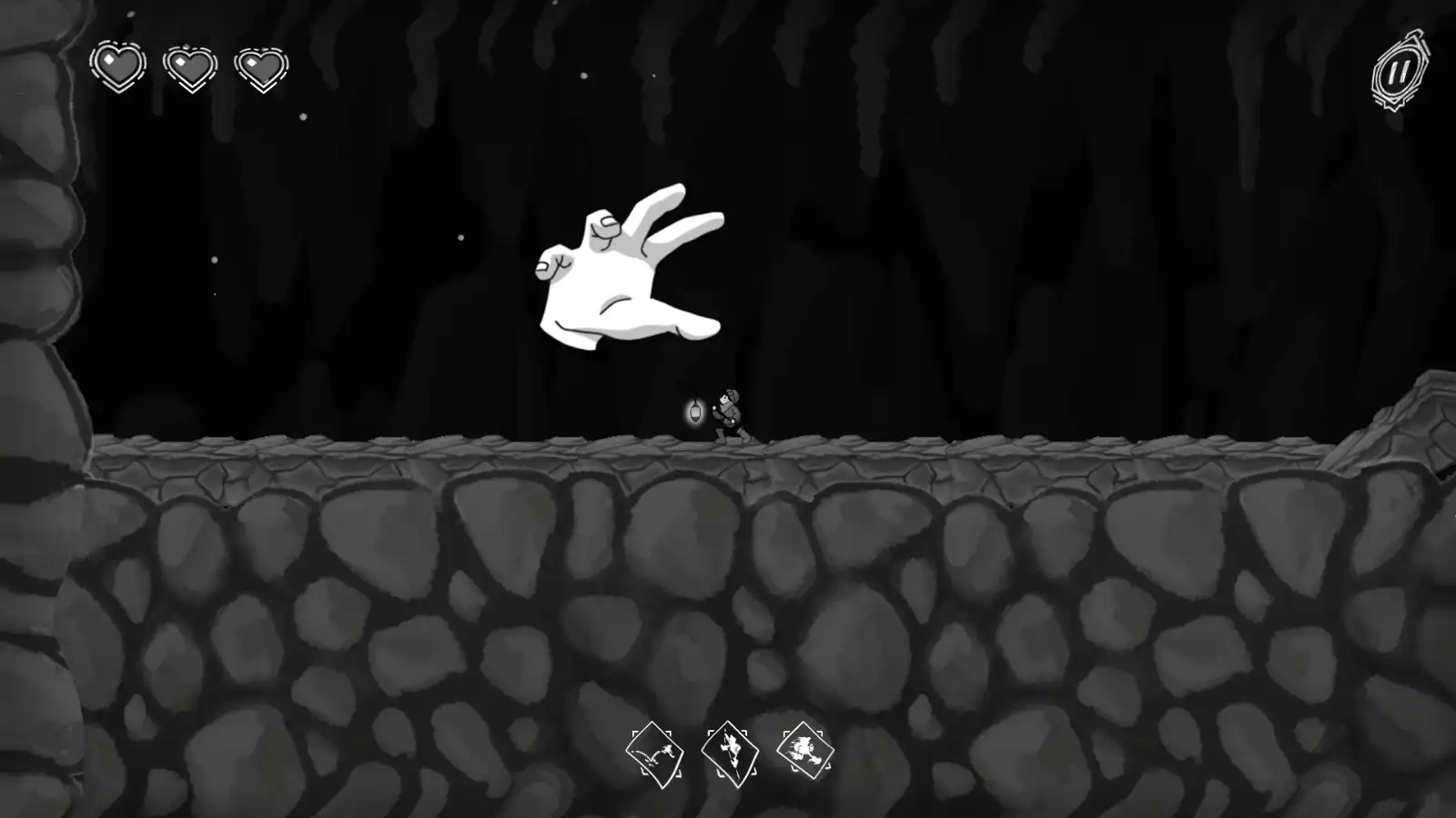 The player fighting against a large, disembodied, floating hand.