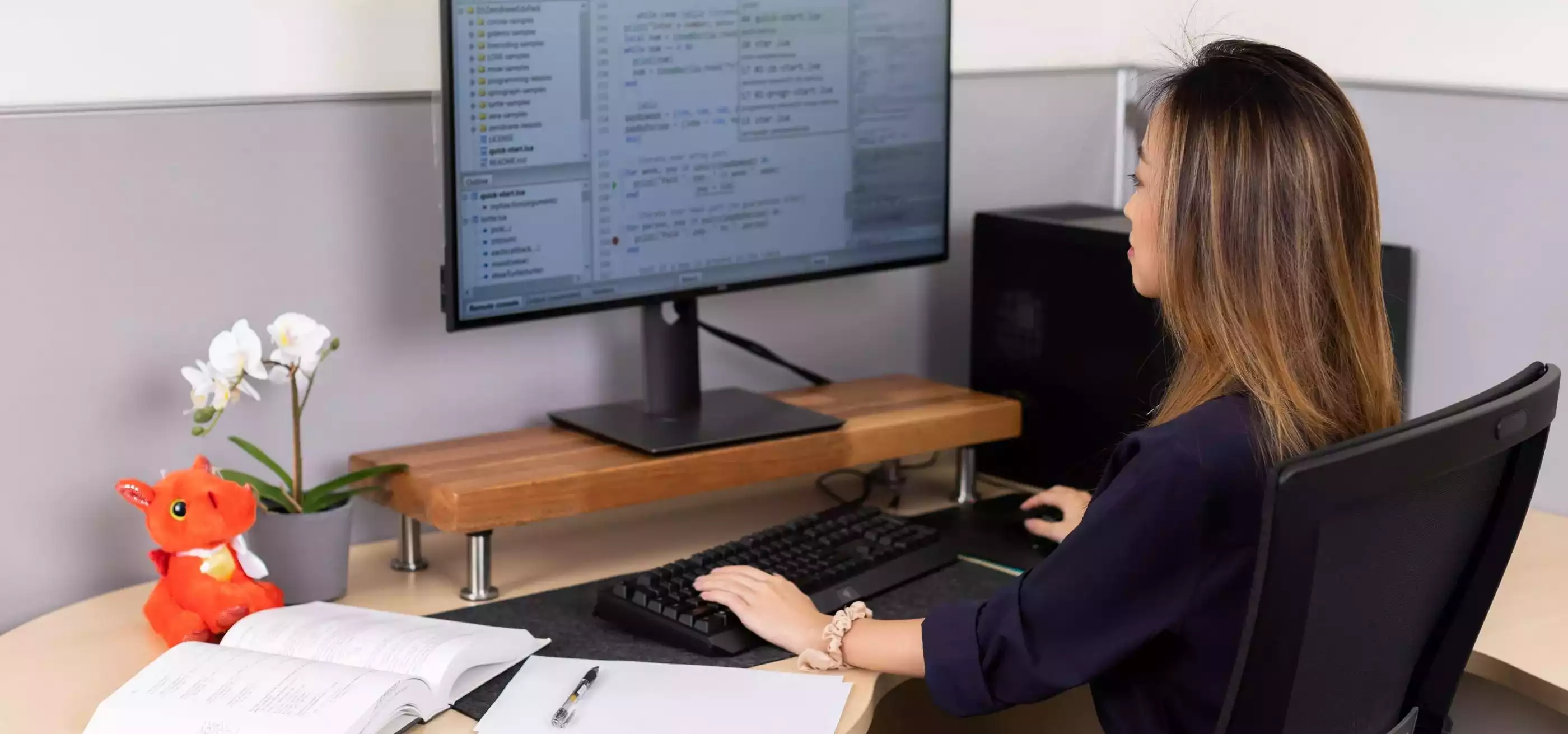 A DigiPen student working at a desk